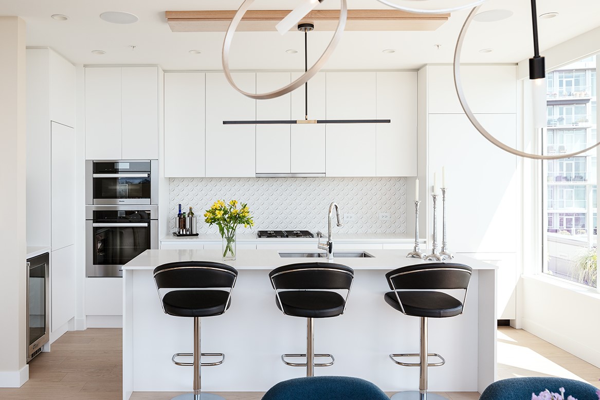 Sleek modern kitchen with glass cabinets